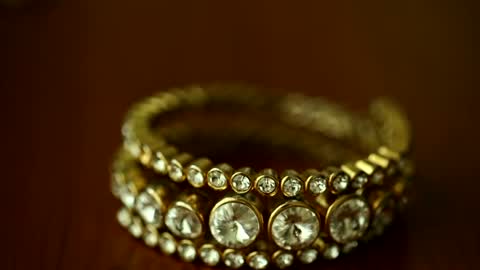 Gold-tone rhinestone bangles