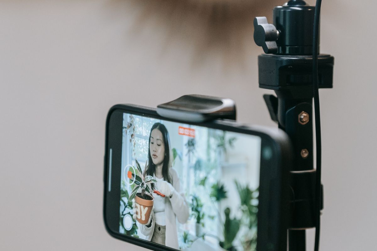 Phone on a stand streaming a live shopping show