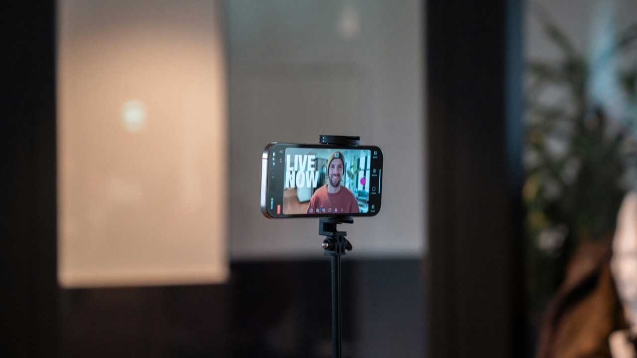 Smartphone on a tripod streaming a live show